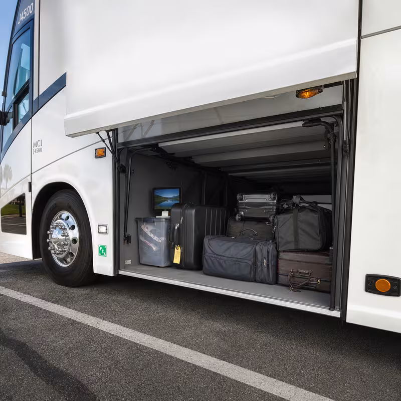 Party bus interior with wraparound leather seating and LED lighting in Tallahassee