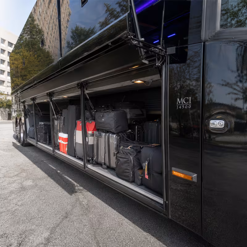 Party bus interior with wraparound leather seating and LED lighting in Tallahassee