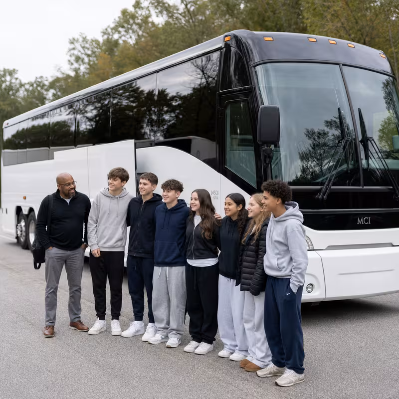 Passengers loading luggage while boarding an Tallahassee group shuttle